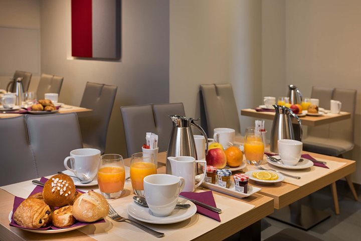 Salle à petit-déjeuner, Hôtel Magellan